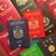 Blue,And,Red,Biometric,Passports,Of,United,Arab,Emirates,On