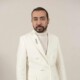 Mohammed Ashi is a Saudi fashion designer who has achieved international success and redefined high-end garment design.